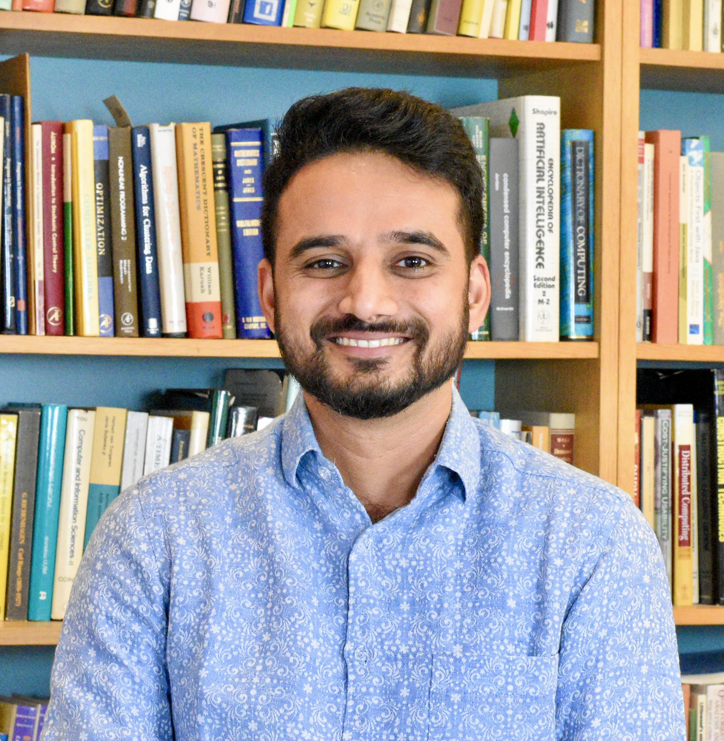 Headshot of Arjun Menon