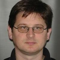 Headshot of Cristian Bogdan.