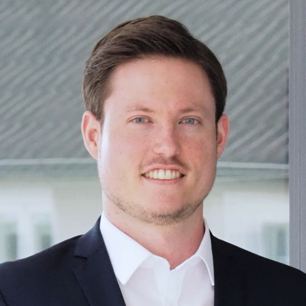 Headshot of Tobias Drey.